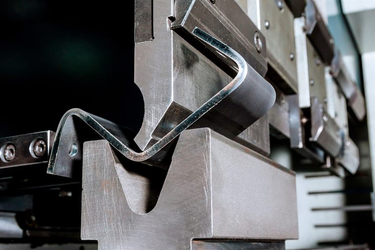 Fabrication on the 135-tonne press brake in the POBOX workshop