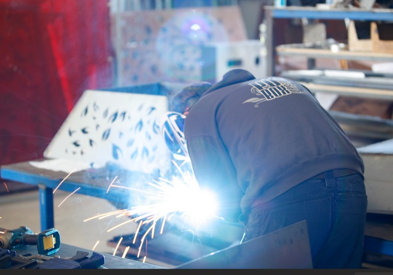 Pulse MIG welding a fabrication in the POBOX workshop