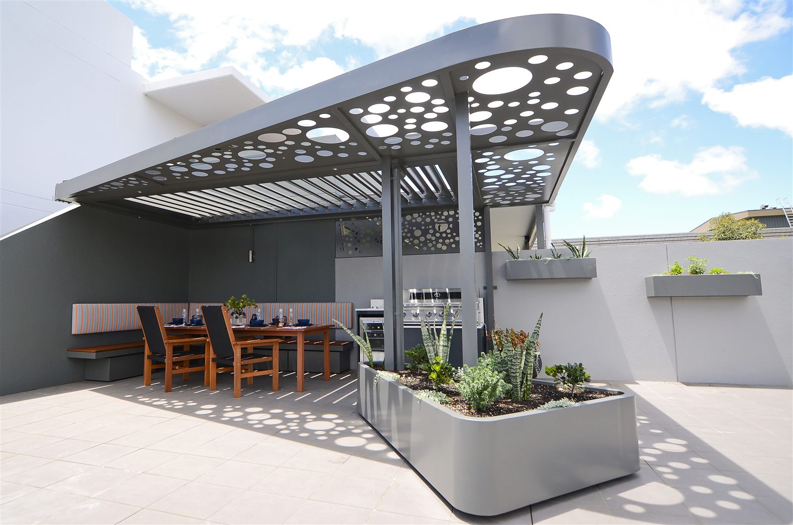 Completed POBOX pergola with laser-cut canopy