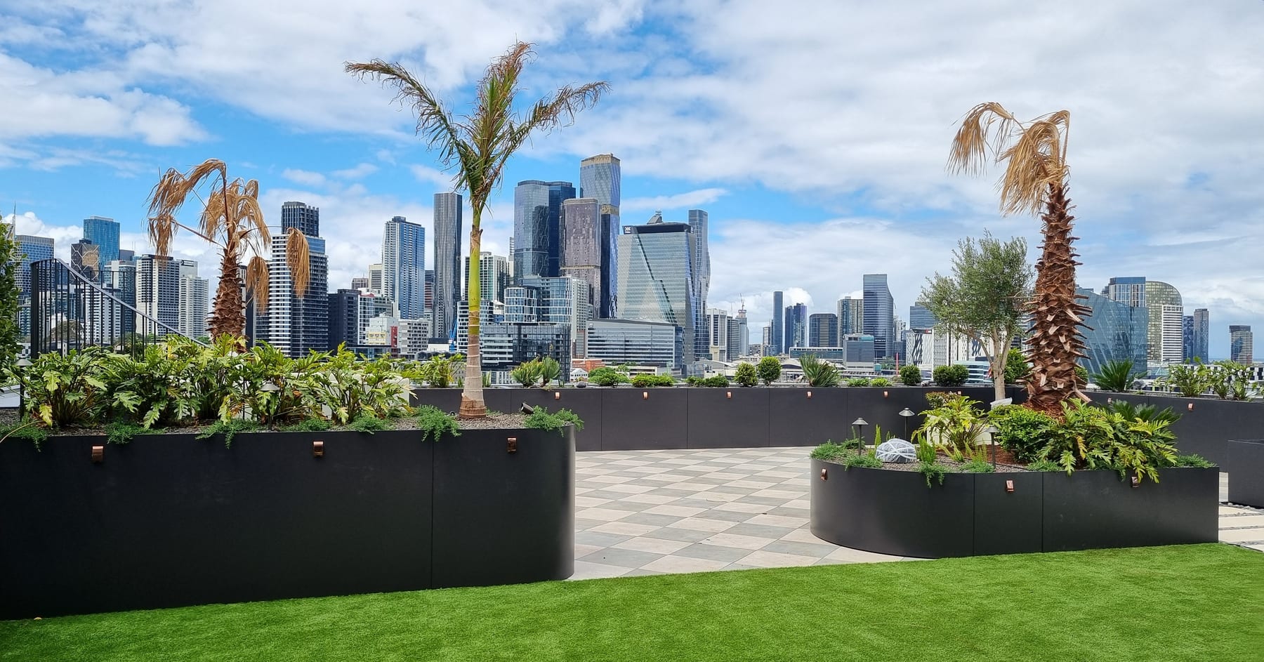 A completed rooftop garden with aluminium planters