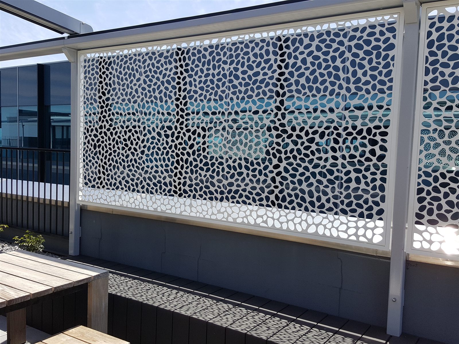 Installed POBOX laser-cut privacy screen
